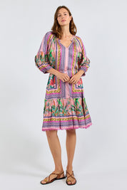 Model Genericm wearing size sample of the Zilara Dress – Orchid in colour Orchid, from the front