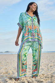 Model Eshan wearing size 10 of the Zilara Kaftan Top – Mist in colour Mist, from the front