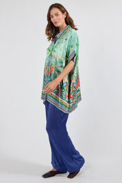 Model Genericm wearing size sample of the Zilara Kaftan Top – Mist in colour Mist, from the front