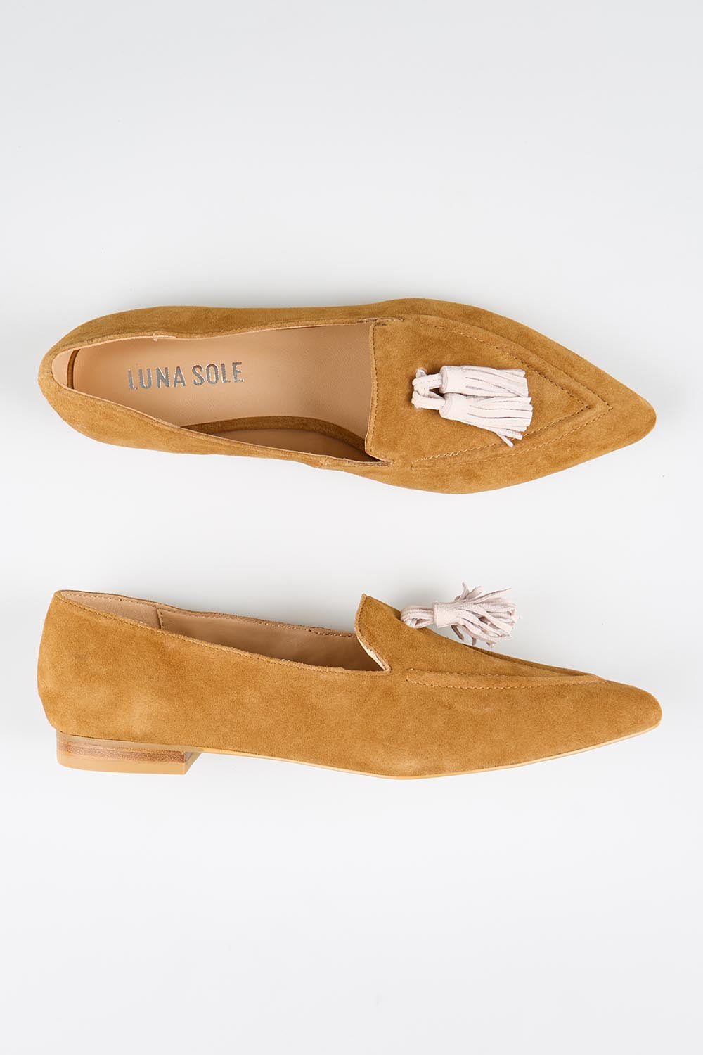 Model Genericm wearing size sample of the Palace Loafer - Browncreme in colour Browncreme, from an angle