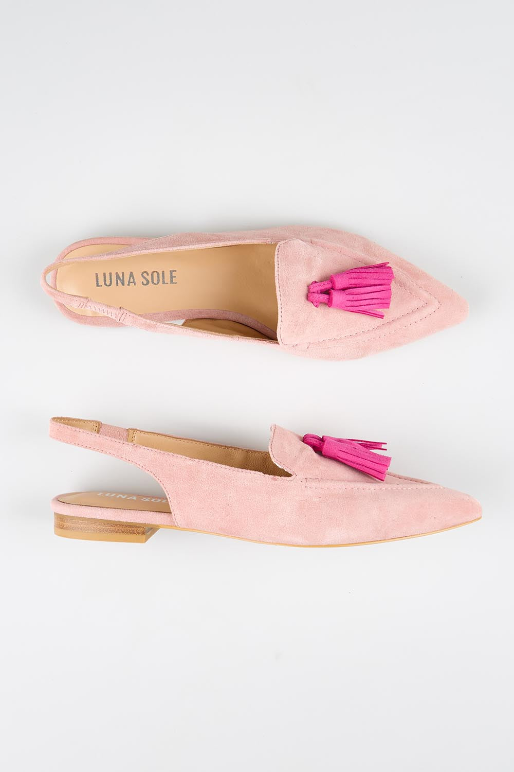 Model Genericm wearing size sample of the Piper Slingback Flat - Palepinkfush in colour Palepinkfush, in a cropped view