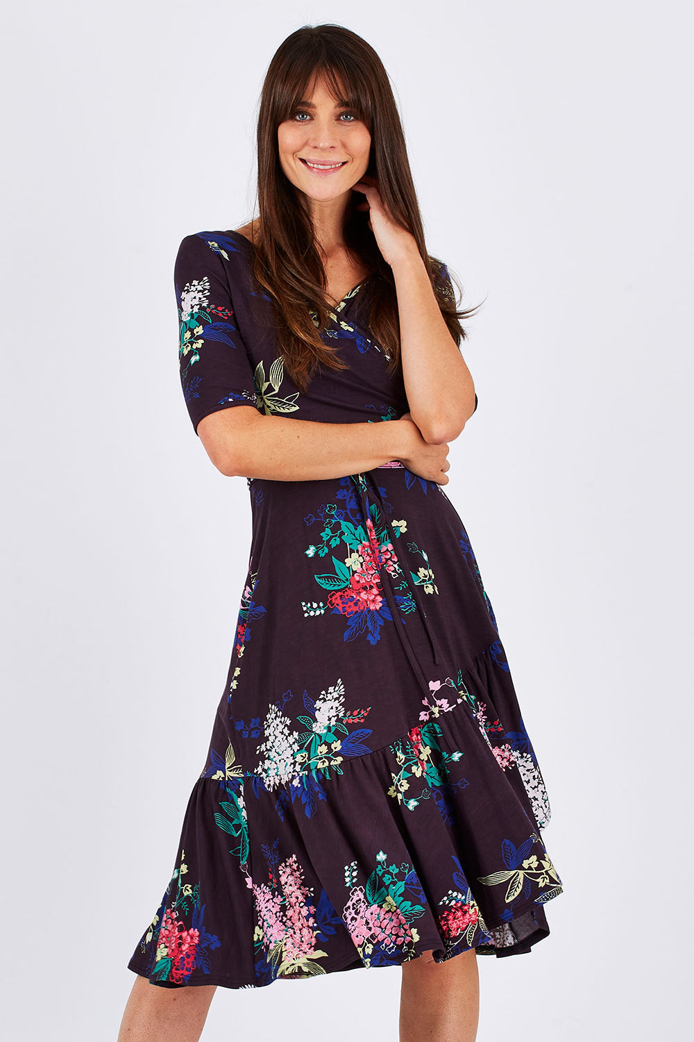 Model Monique wearing size 10 of the City Of Lights Dress in colour Black (Black), from the front, cropped image