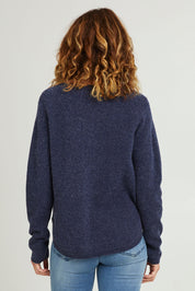 Model Luisa wearing size S of the Bristol Sweater in colour Softblue (Blue), from the back