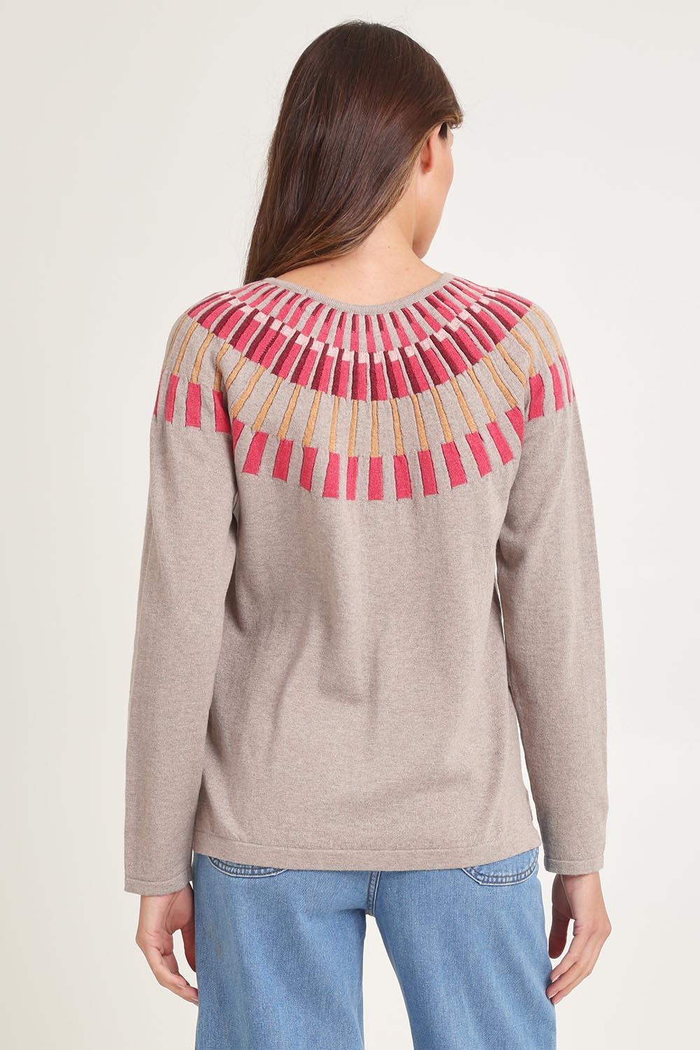 Model Madeline wearing size S of the Josephine Merino Sweater in colour Mushroom, from the back