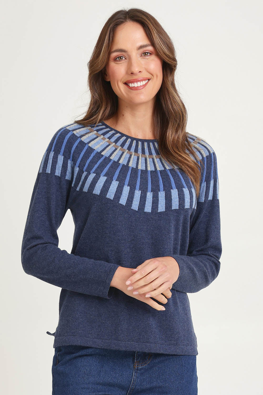 Model Madeline wearing size S of the Josephine Merino Sweater in colour Softblue (Blue), from the front, cropped image
