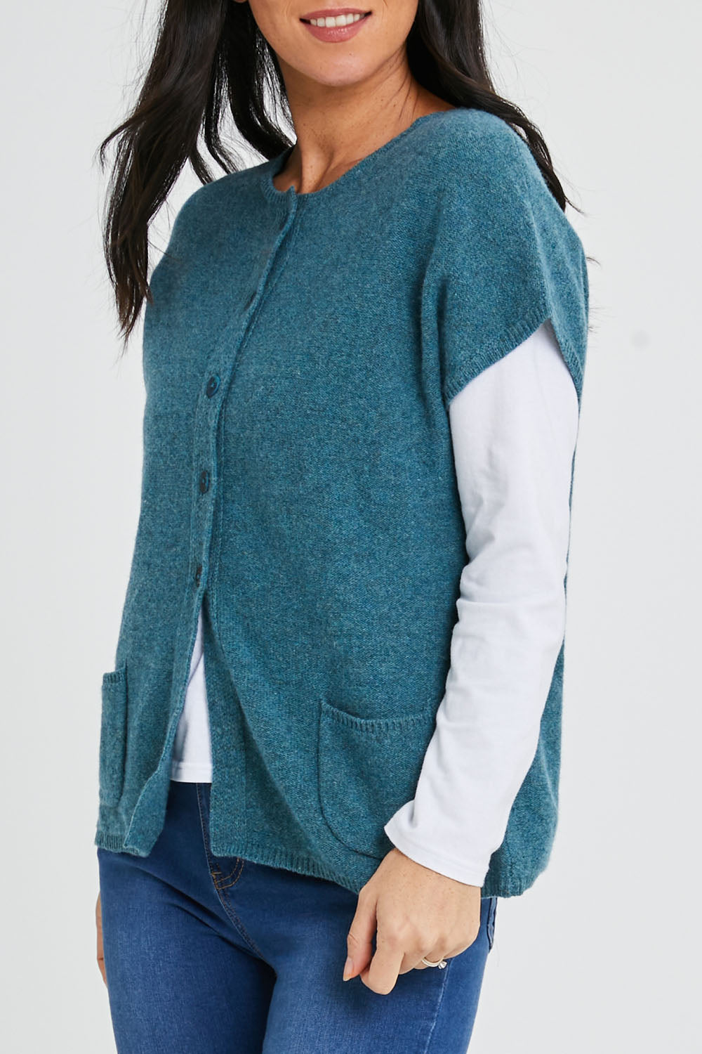 Model Katie wearing size S of the Komma Sweater in colour Aqua (Green), from the front, cropped image