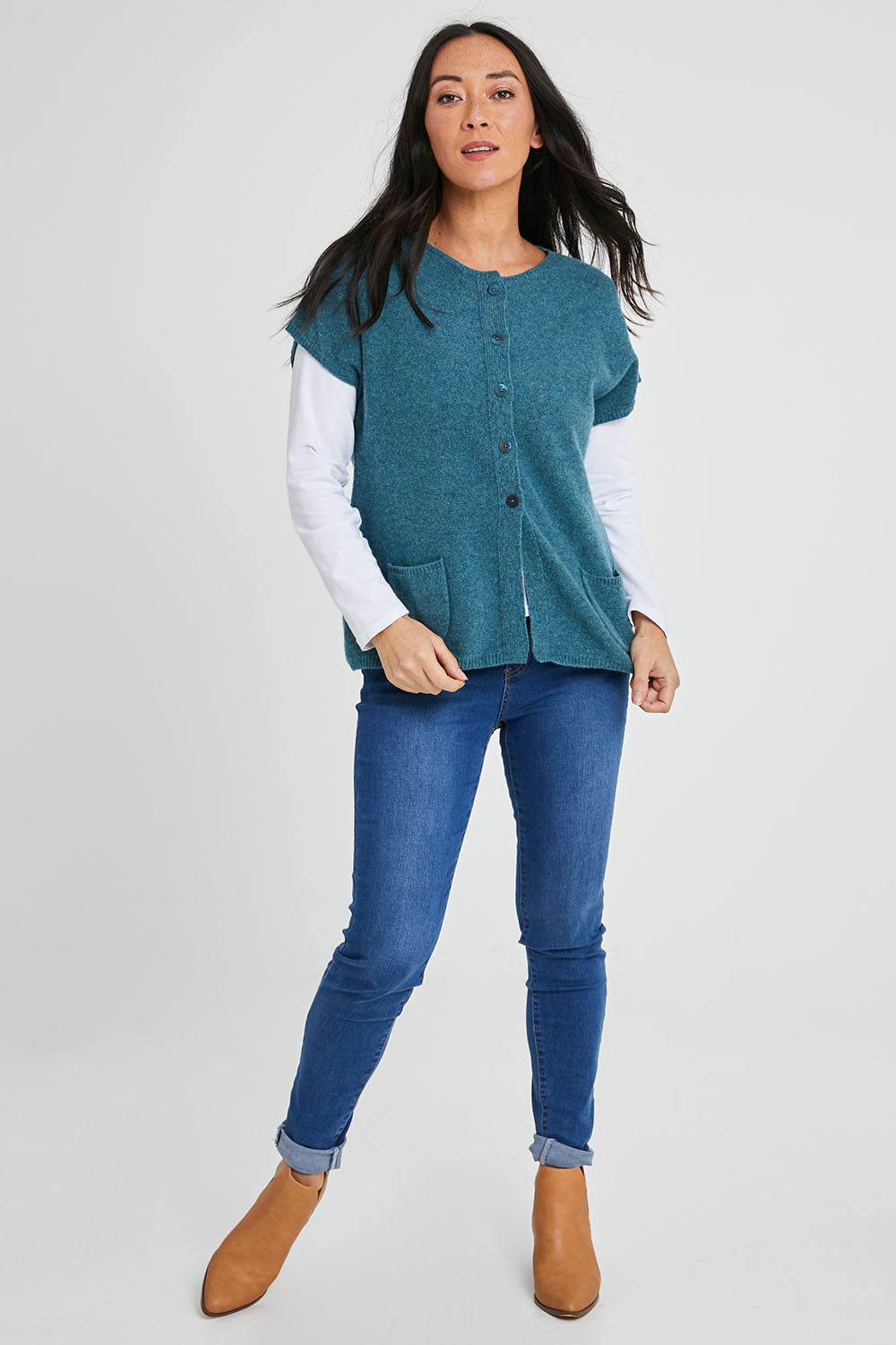 Model Katie wearing size S of the Komma Sweater in colour Aqua (Green), from the front, showing the whole outfit