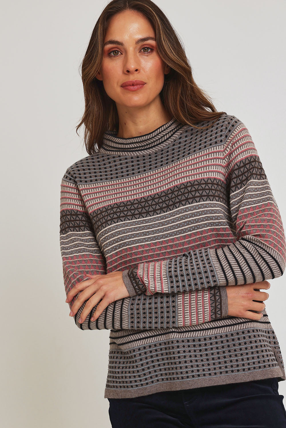 Model Madeline wearing size S of the Ricardo Organic Cotton Sweater in colour Walnut, from the front, cropped image