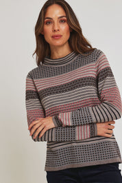 Model Madeline wearing size S of the Ricardo Organic Cotton Sweater in colour Walnut, from the front, cropped image