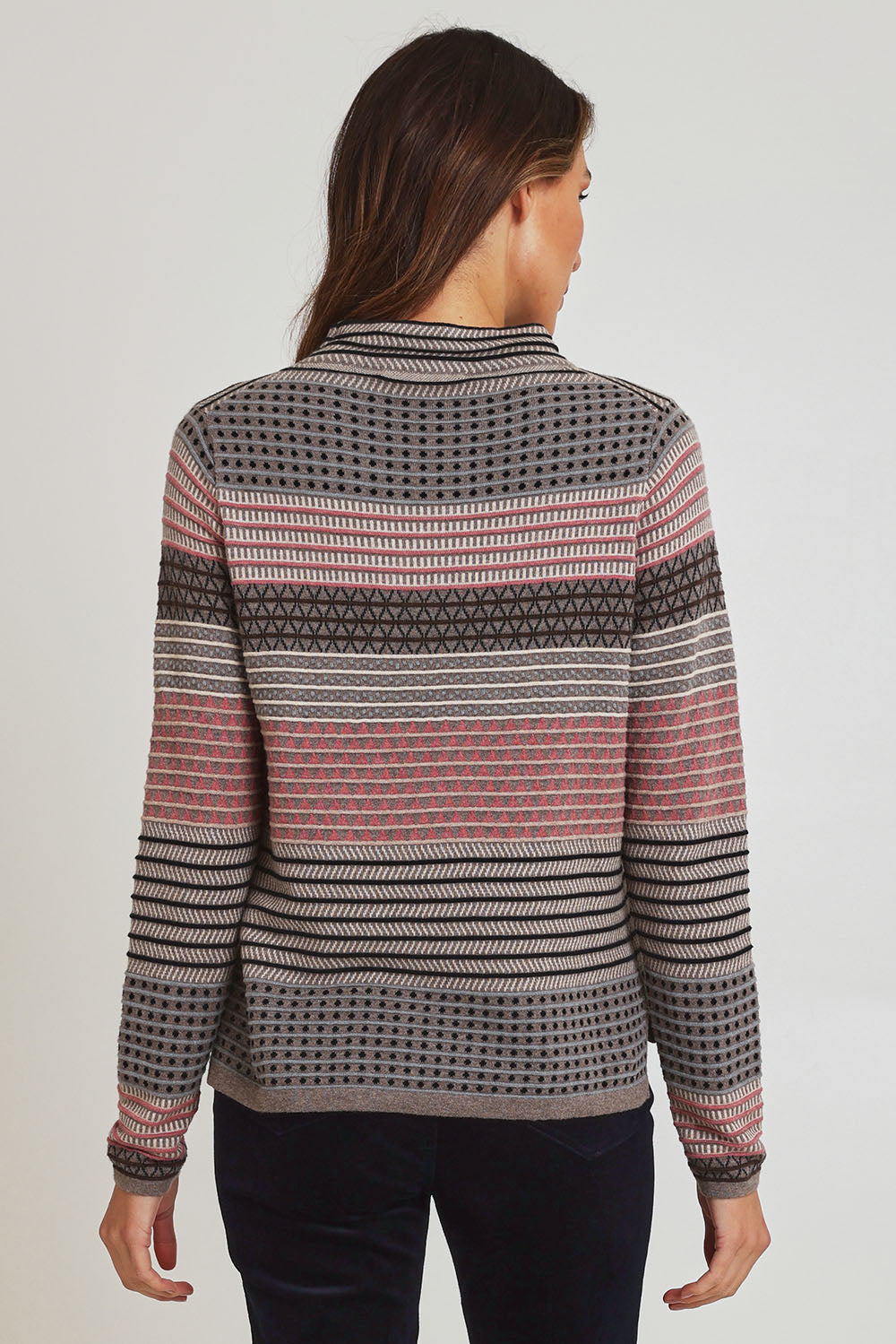 Model Ziara wearing size S of the Ricardo Organic Cotton Sweater in colour Walnut, from the back