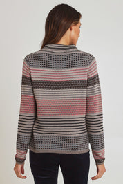 Model Ziara wearing size S of the Ricardo Organic Cotton Sweater in colour Walnut, from the back