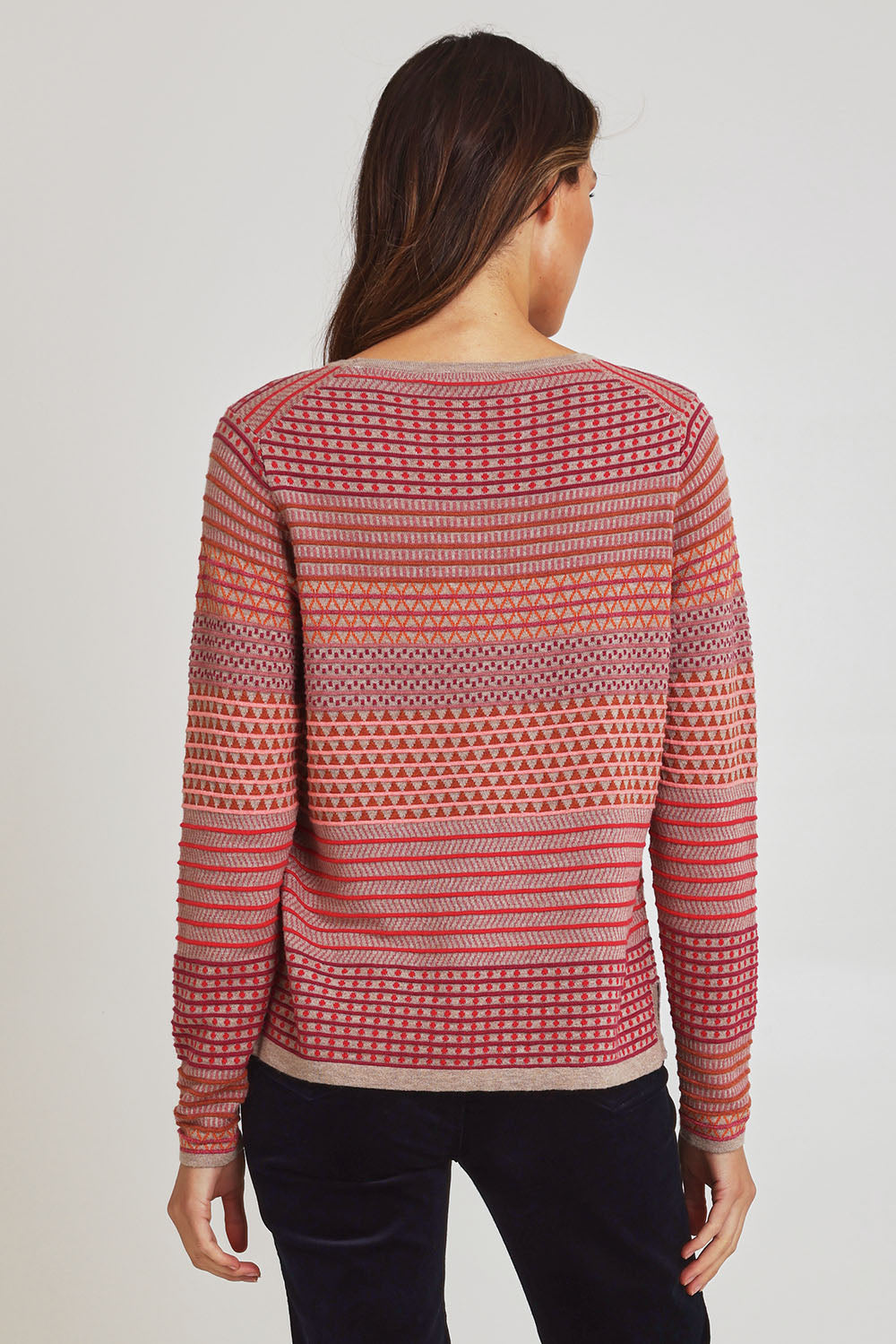 Model Madeline wearing size S of the Rihanna Organic Cotton Sweater in colour Mushroom, from the back