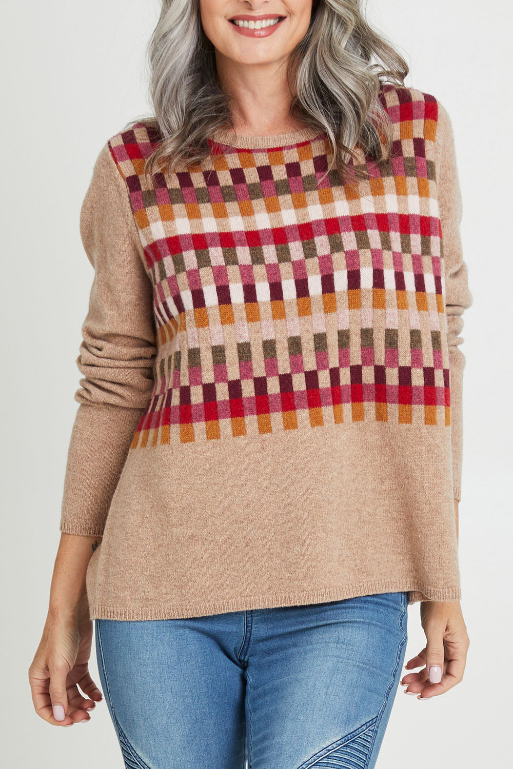 Model Luisa wearing size S of the Salka Sweater in colour Oat, from the front, cropped image