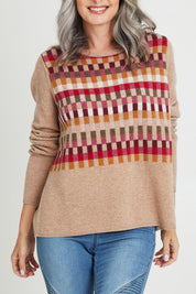 Model Luisa wearing size S of the Salka Sweater in colour Oat, from the front, cropped image