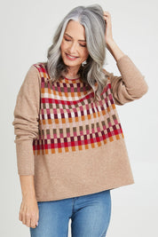 Model Luisa wearing size S of the Salka Sweater in colour Oat, from the front, cropped image