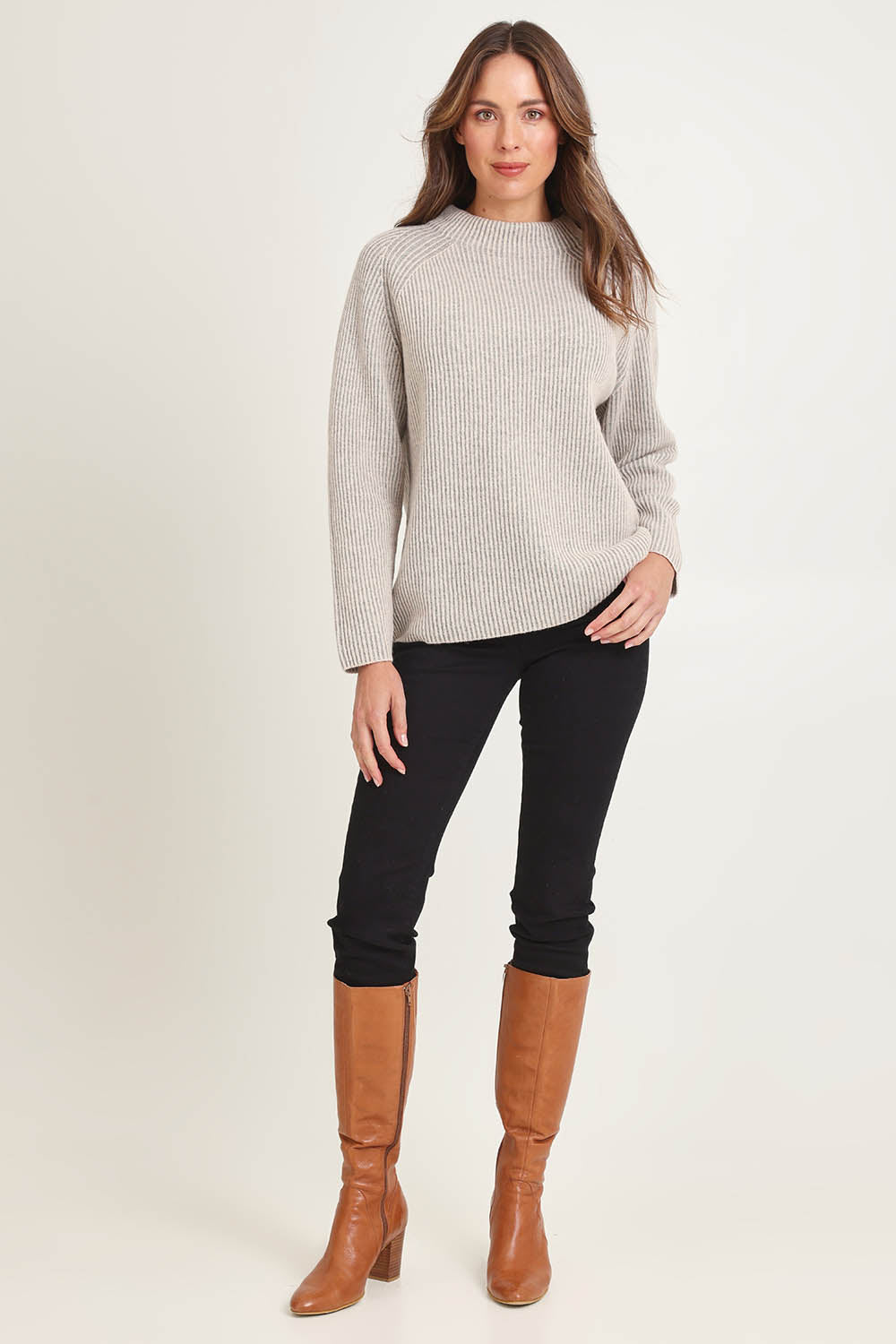 Model Madeline wearing size S of the Somers Lambswool Sweater in colour Oat, from the front, showing the whole outfit