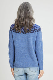 Model Luisa wearing size S of the Vonda Sweater in colour Denim (Blue), from the back