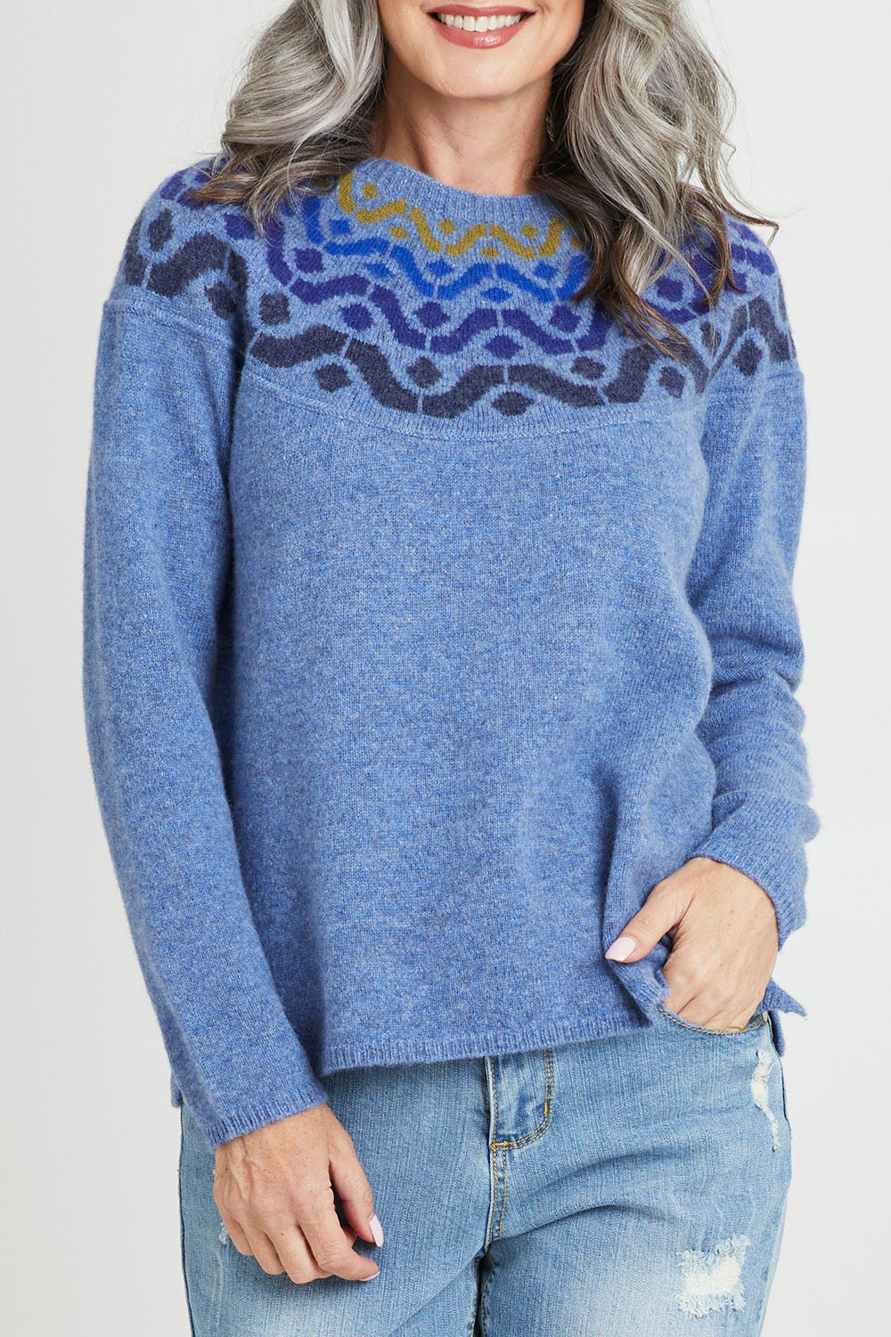 Model Luisa wearing size S of the Vonda Sweater in colour Denim (Blue), from the front, cropped image
