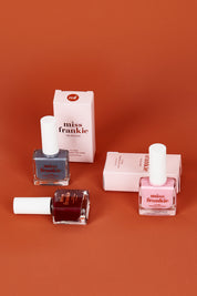 A model wearing size OneSize of the Chip Resistant Nail Polish in colour Hellolover (Pink), from the front, showing the whole outfit