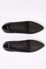 A model wearing size 36 of the Gyro Flat in colour Black (Black), from the front, showing the whole outfit