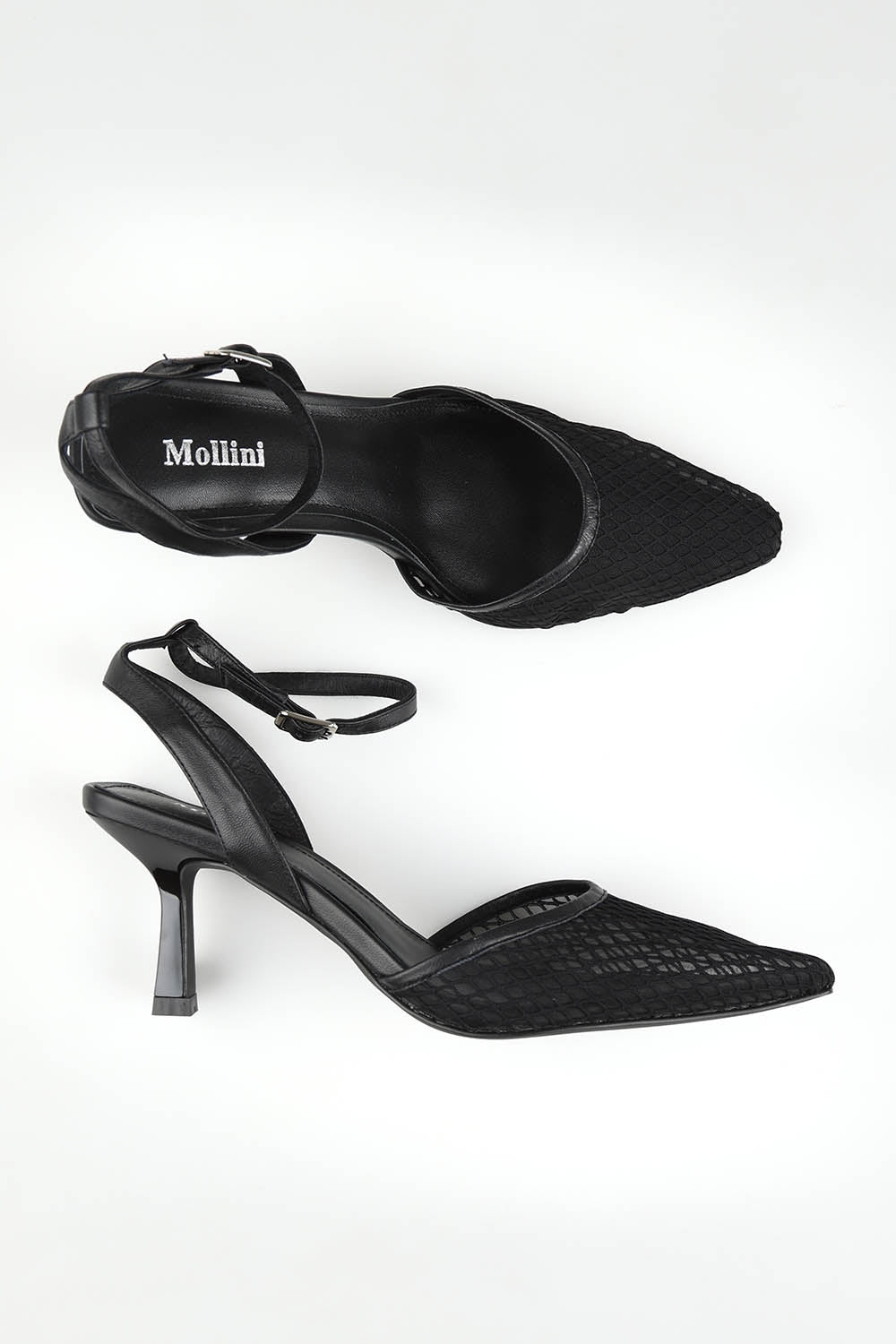 A model wearing size 37 of the Masey Leather Heel in colour Blackmesh (Black), from the front, showing the whole outfit