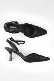 A model wearing size 37 of the Masey Leather Heel in colour Blackmesh (Black), from the front, showing the whole outfit
