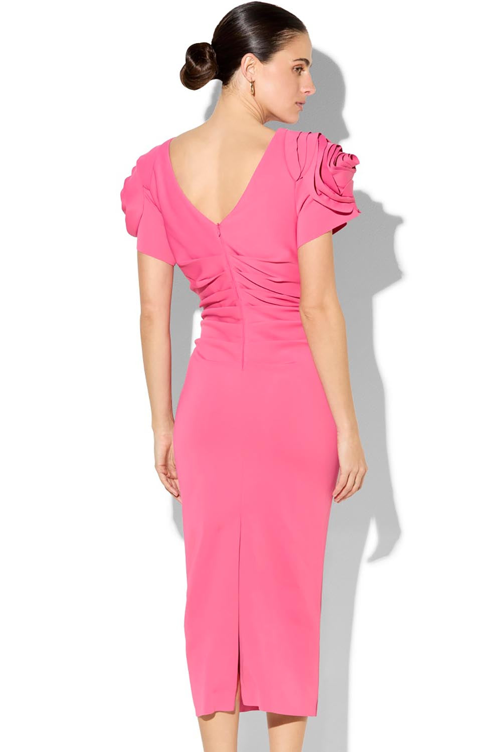 A model wearing the Monelli Rosette Sleeve Dress in colour Pink (Pink), from the back