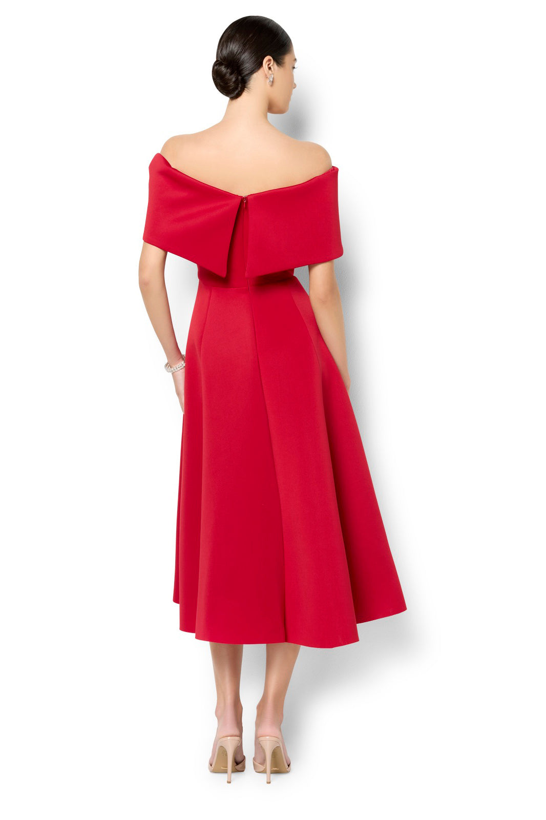 A model wearing the Rowan Cocktail Dress in colour Red (Red), from the back
