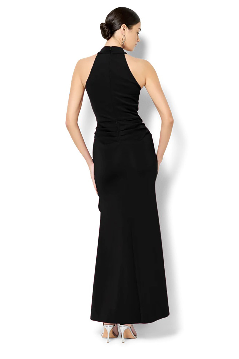 A model wearing the Sebastian Halter Gown in colour Black (Black), from the back