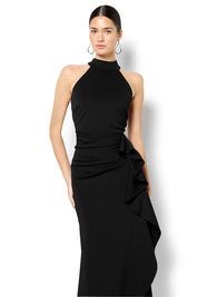 A model wearing the Sebastian Halter Gown in colour Black (Black), from the front, cropped image