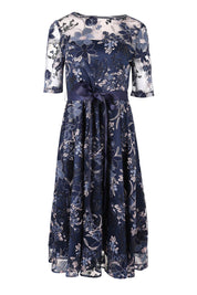 Product shot of the Loren Lace Midi Dress in colour Navypink (Blue), from the front