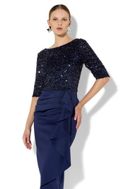 A model wearing the Reeva Sequin Cocktail Dress in colour Navy (Blue), from the front, cropped image