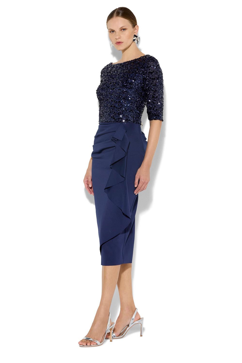 A model wearing the Reeva Sequin Cocktail Dress in colour Navy (Blue), from the front, showing the whole outfit