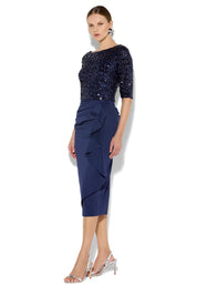 A model wearing the Reeva Sequin Cocktail Dress in colour Navy (Blue), from the front, showing the whole outfit