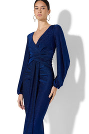 A model wearing the Serena Shimmer Maxi Gown in colour Sapphire (Blue), from the front, cropped image