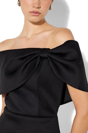 A model wearing the Finlay Cocktail Dress in colour Black (Black), from the front, cropped image
