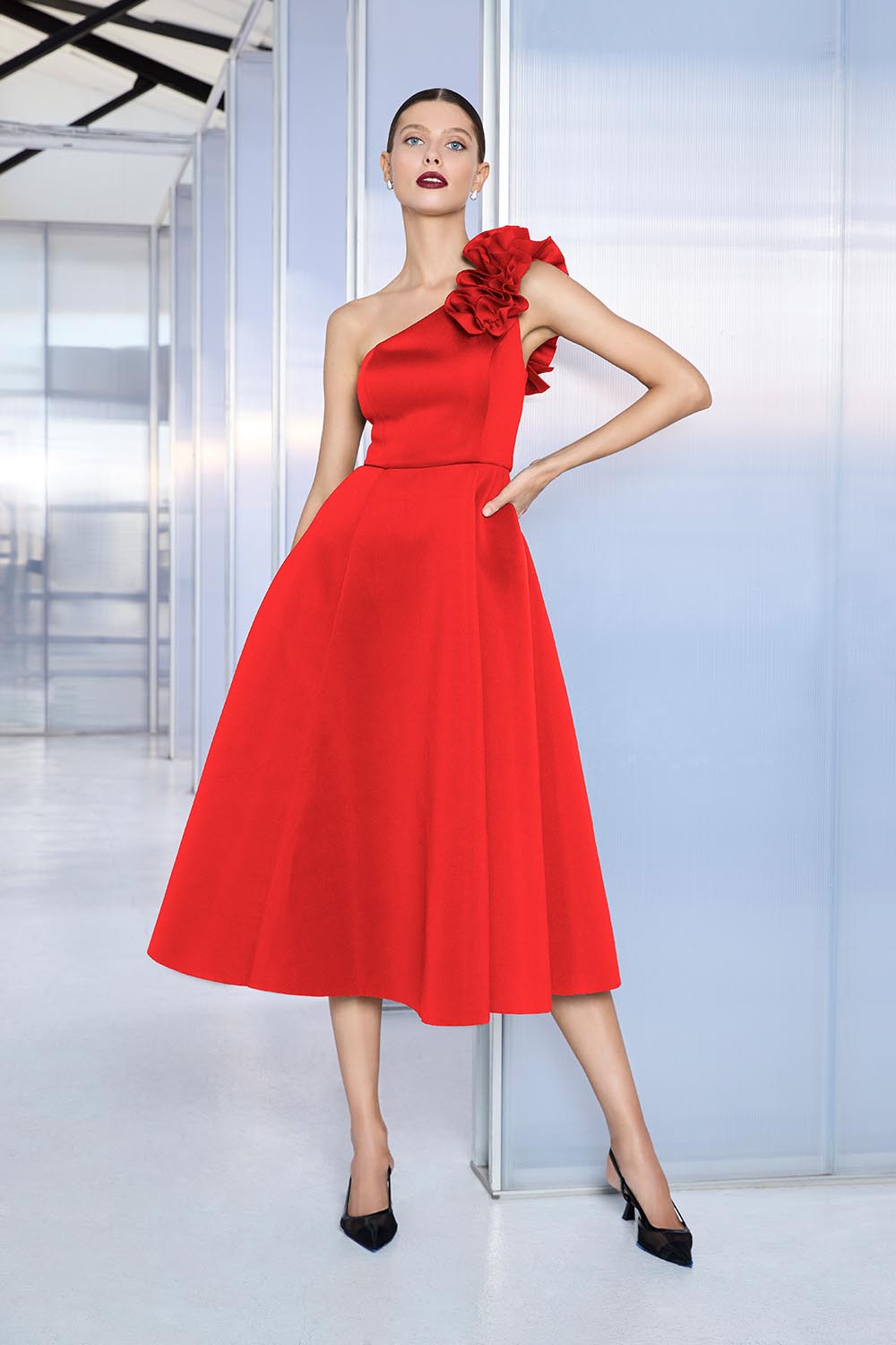 A model wearing the Skye Cocktail Dress in colour Red (Red), from the front, showing the whole outfit