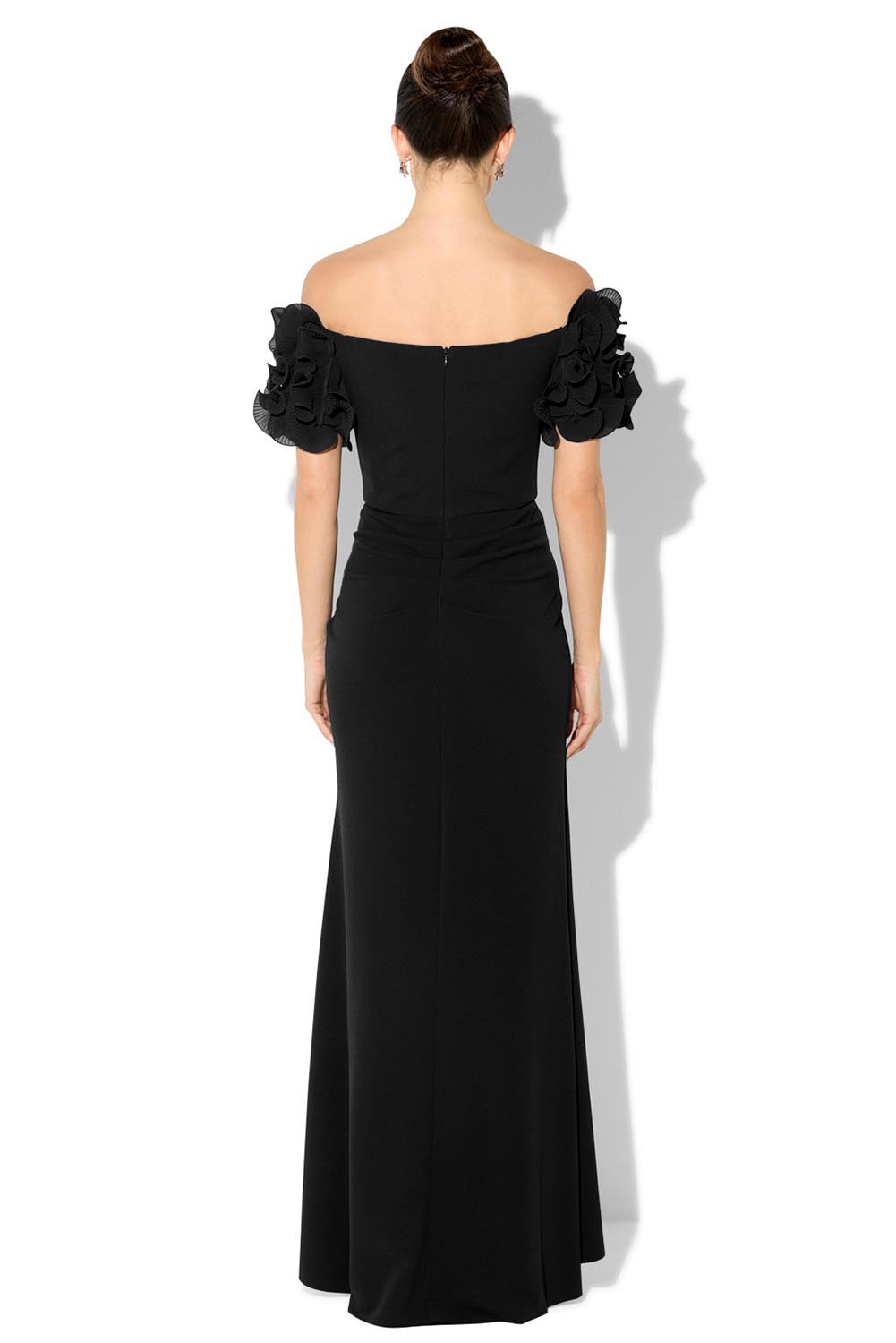 A model wearing the Diana Ruffle Sleeve Gown in colour Black (Black), from the back