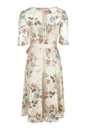 Product shot of the Pippa Embroidered Dress in colour Mink (Pink), from the back