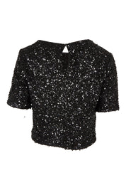 Product shot of the Ginger Sequin Top in colour Black (Black), from the back