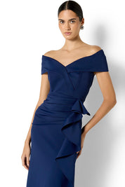 Model Genericm wearing size sample of the Delana Off the Shoulder Gown - Navy in colour Navy, in a cropped view