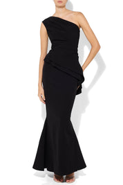 A model wearing the Oscar One Shoulder Gown in colour Black (Black), from the front, cropped image