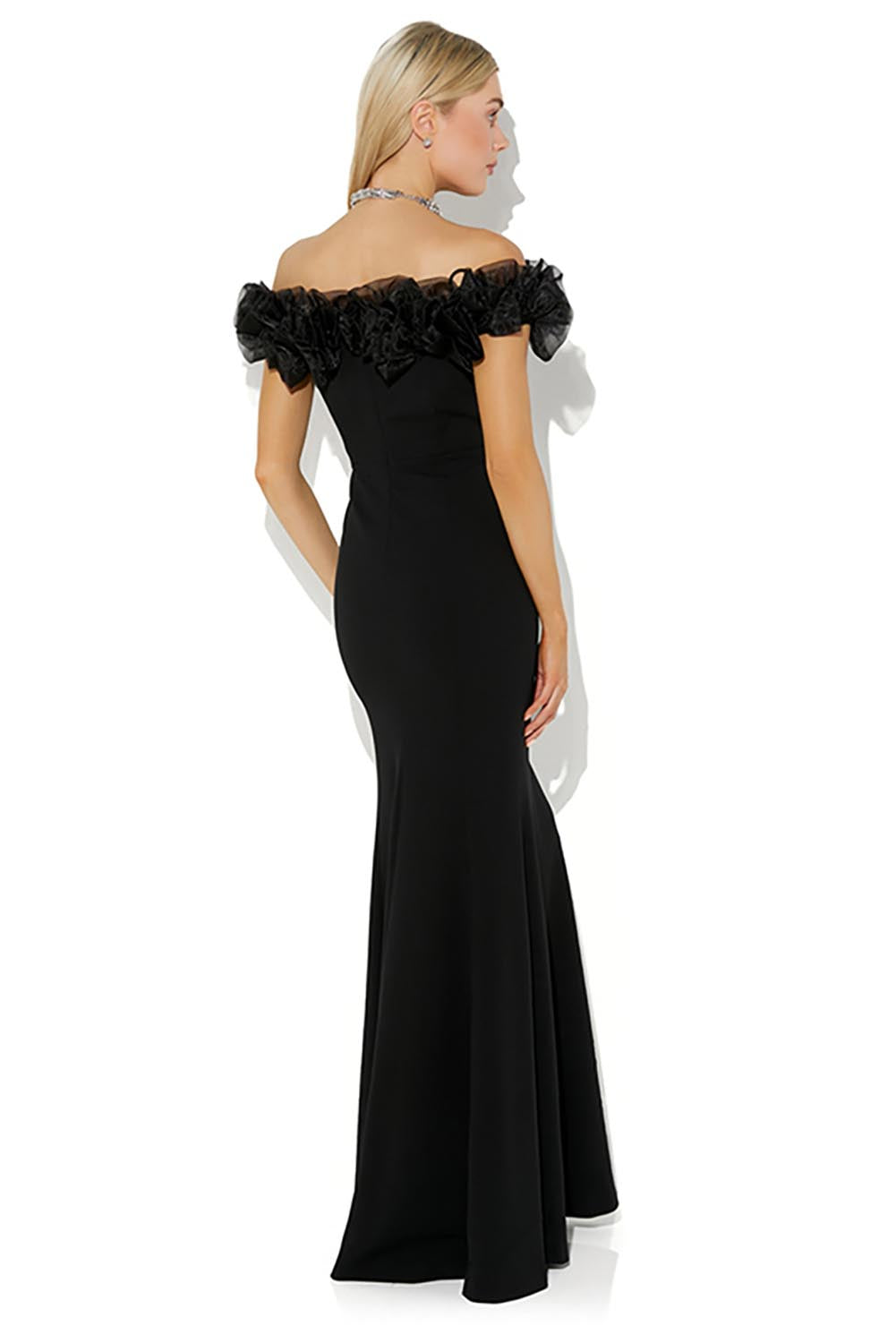 A model wearing the Mischa Organza Rose Gown in colour Black (Black), from the back