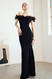 A model wearing the Mischa Organza Rose Gown in colour Black (Black), from the front, showing the whole outfit