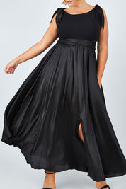 Model Fiona wearing size 16 of the Chloe Dress in colour Black (Black), from the front, cropped image