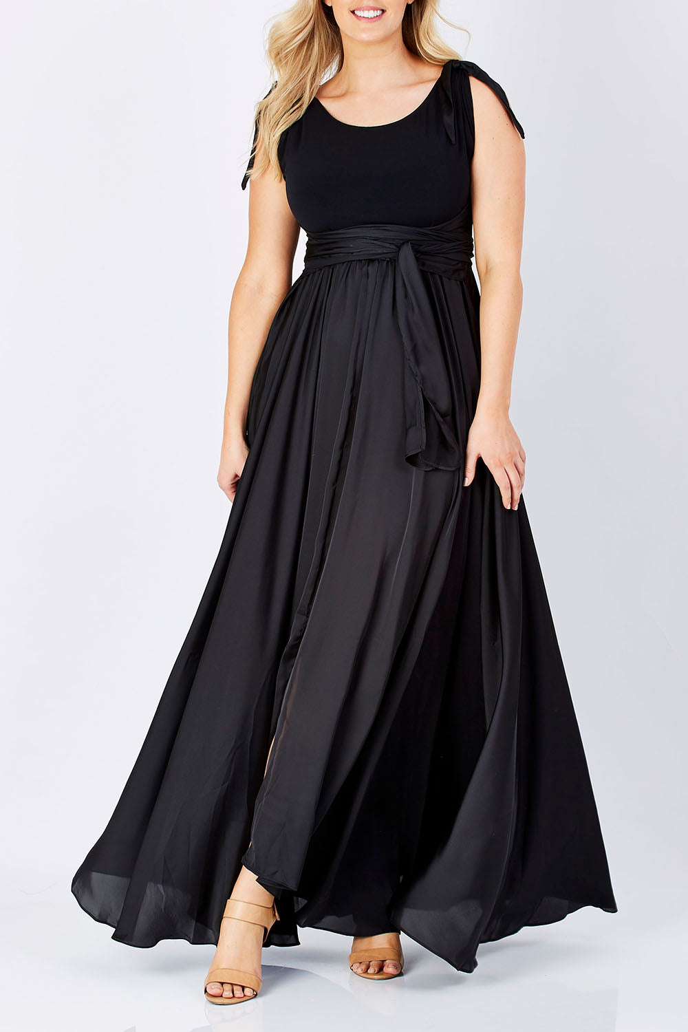 Model Jess wearing size 12 of the Chloe Dress in colour Black (Black), from the front, cropped image