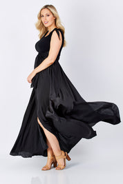 Model Jess wearing size 12 of the Chloe Dress in colour Black (Black), from the front, showing the whole outfit