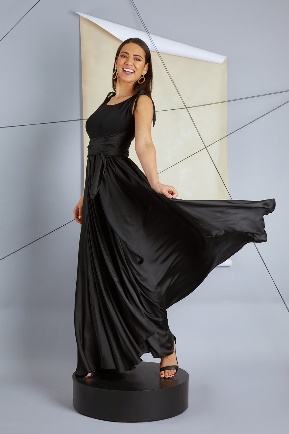 Model Pamela wearing size 10 of the Chloe Dress in colour Black (Black), from the front, showing the whole outfit