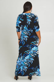 Model Ashleigh wearing size 16 of The Printed Nadine Dress in colour Nightfleur (Black), from the back