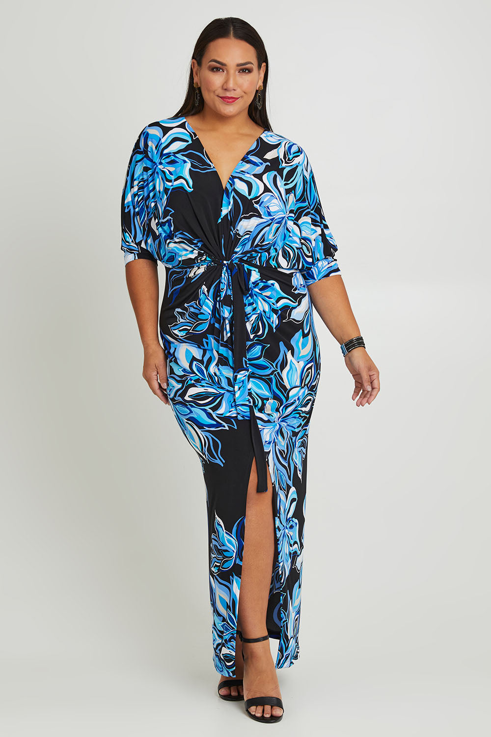 Model Ashleigh wearing size 16 of The Printed Nadine Dress in colour Nightfleur (Black), from the front, showing the whole outfit